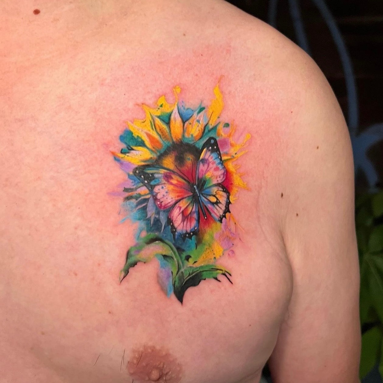 Watercolor sunflower and butterfly tattoo by Ruthless